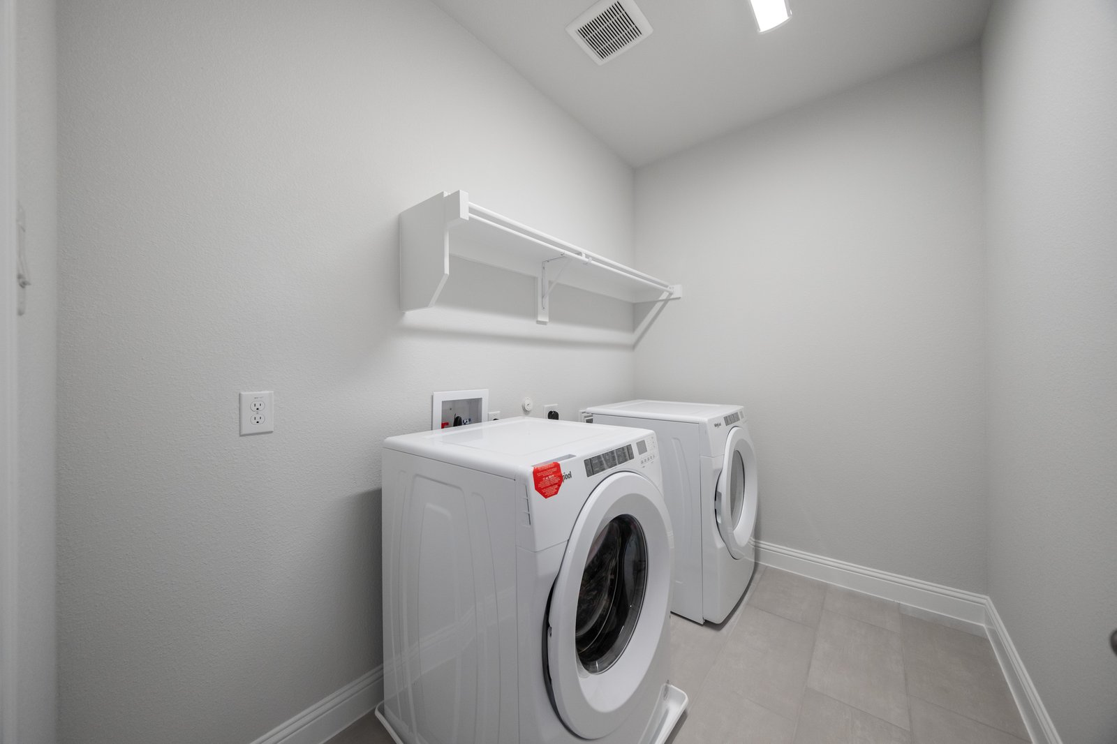 laundry room with washer and dryer