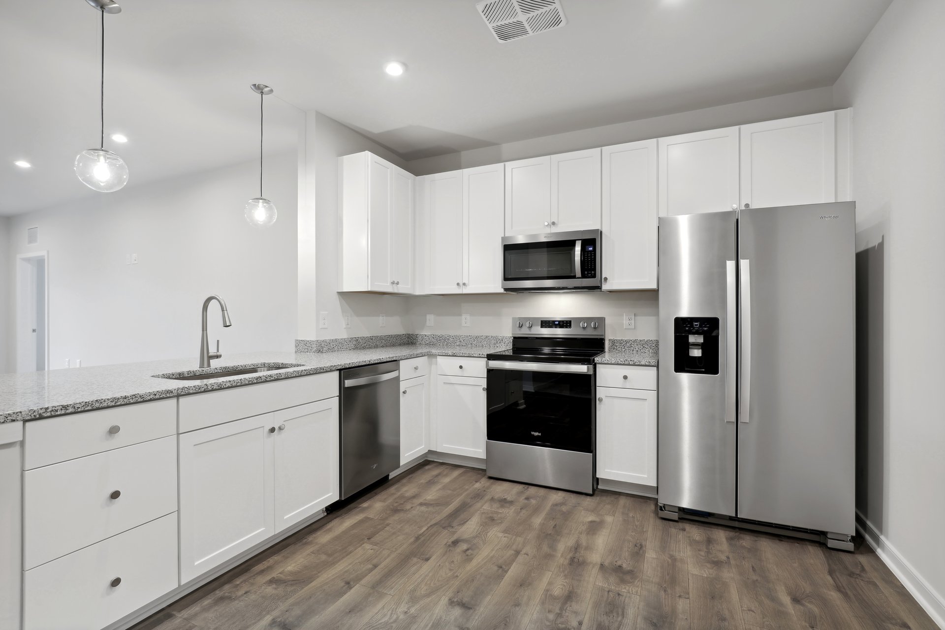 kitchen with quartz countertops and stainless steel appliances