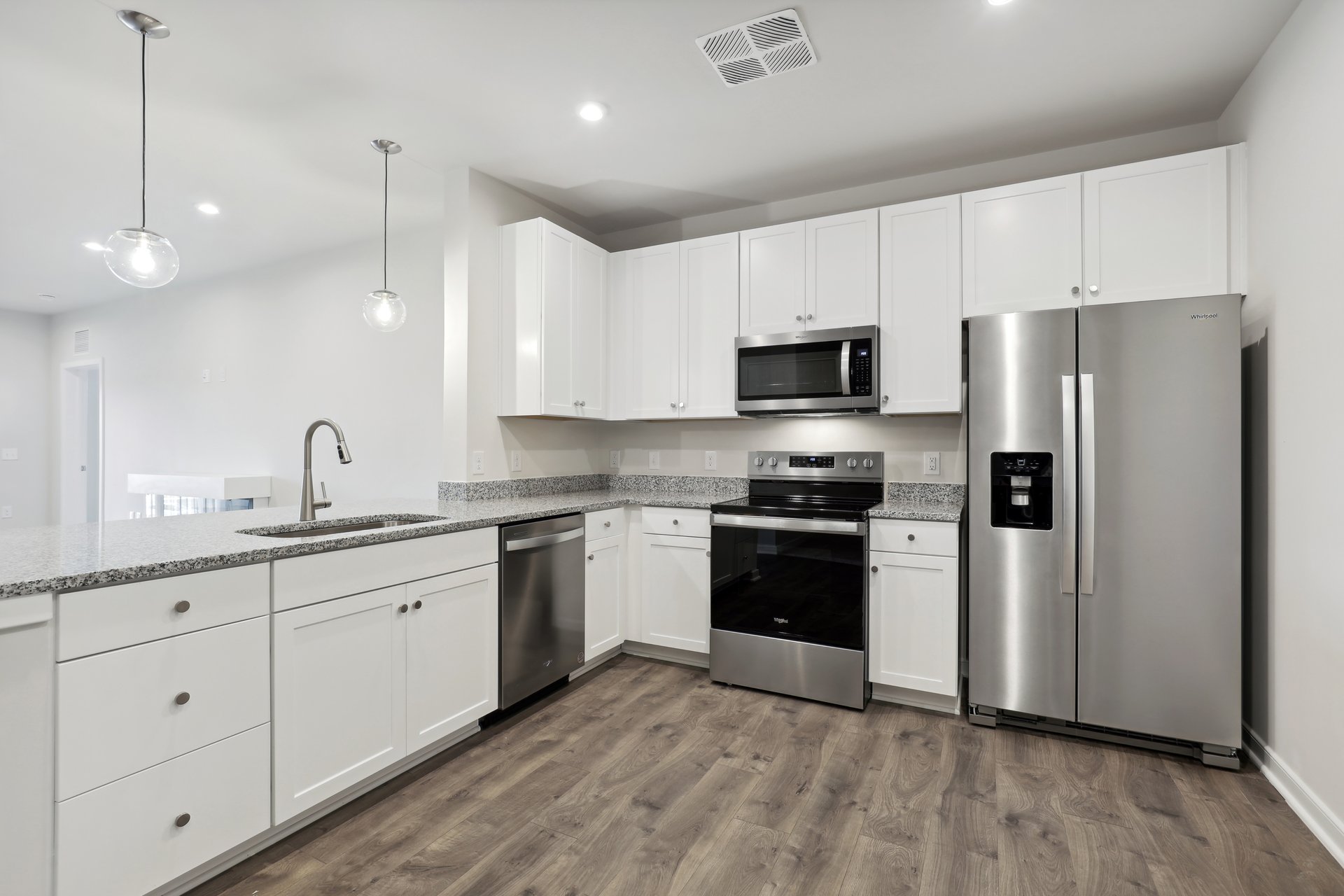 kitchen with quartz countertops and stainless steel appliances