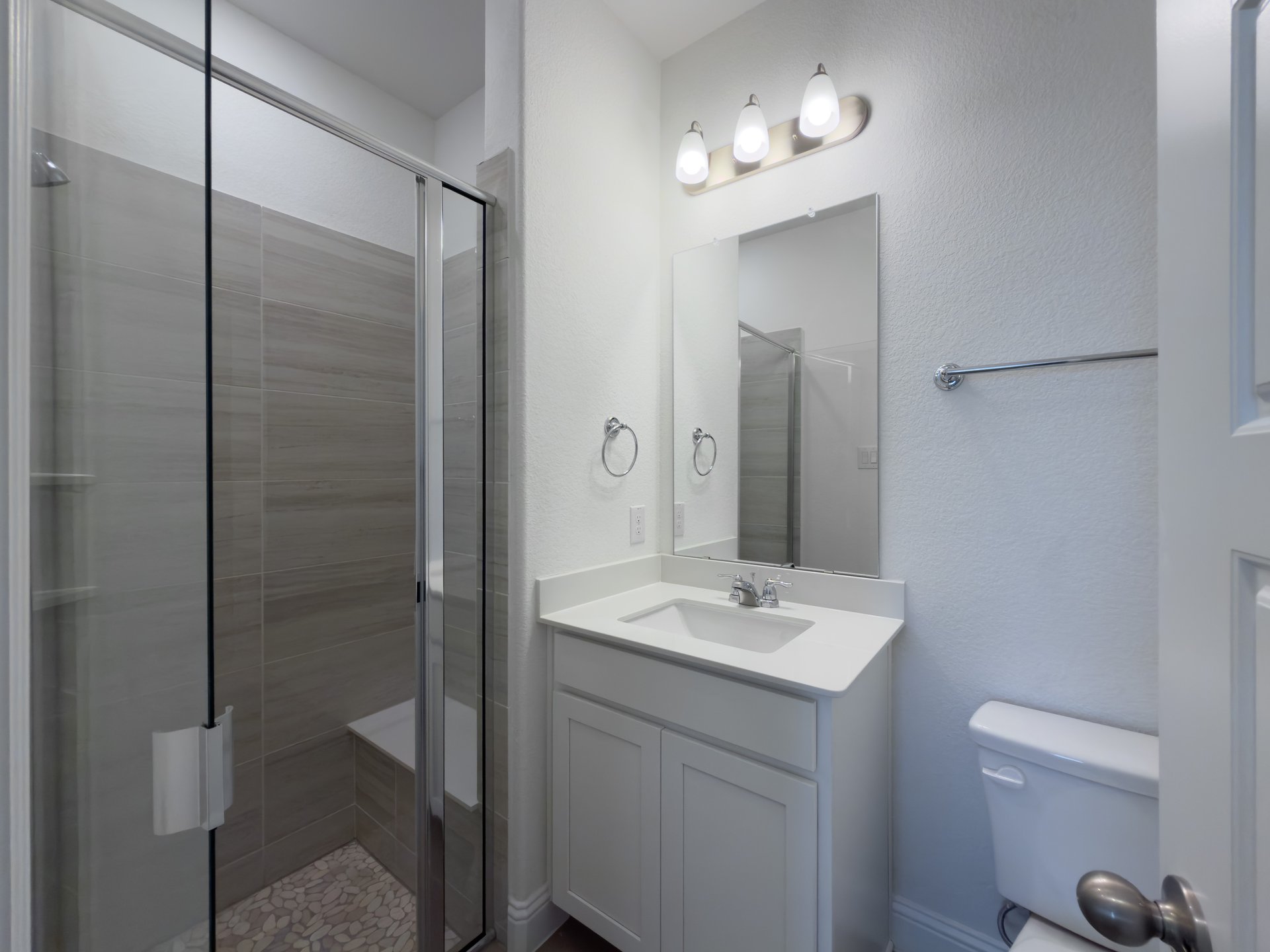guest bathroom with walk-in shower