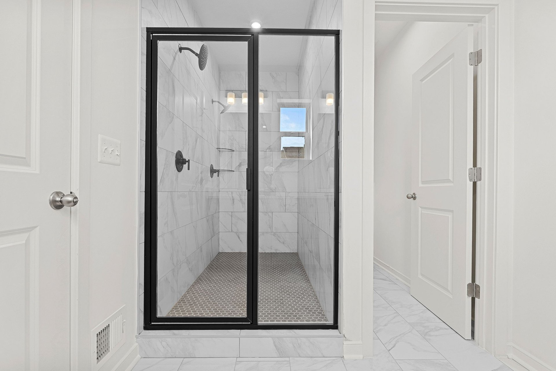 primary bathroom with an oversized shower