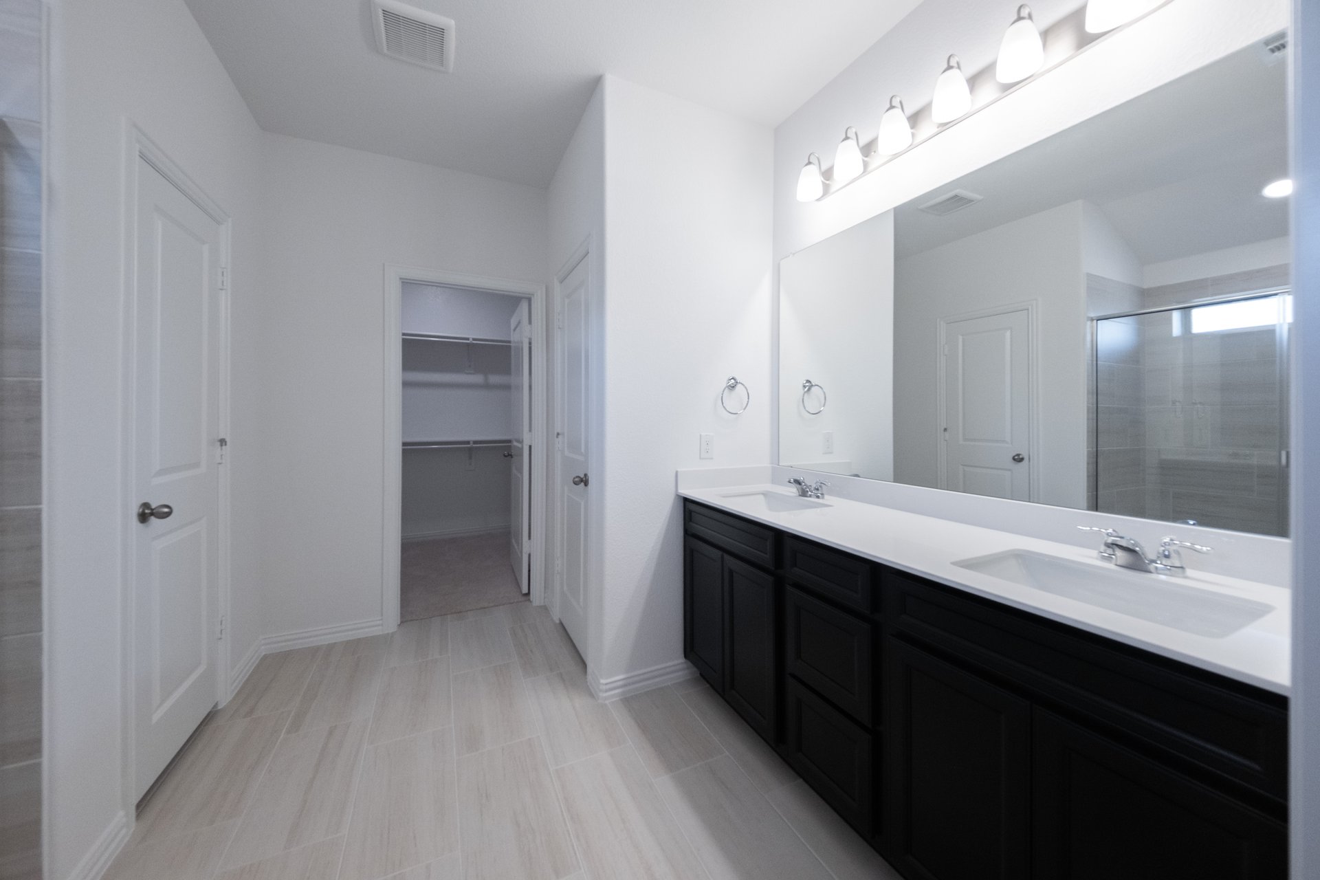 primary bathroom with double sinks