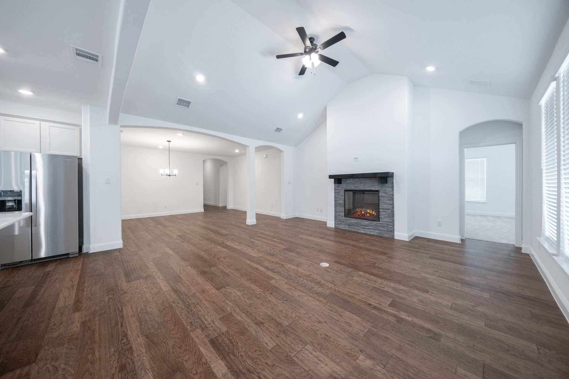 spacious great room with electric fireplace