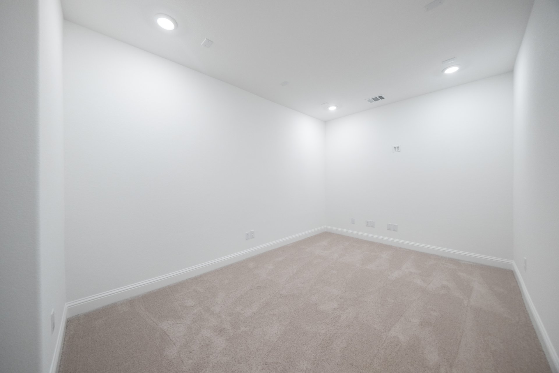 spacious media room with carpet and recessed lighting