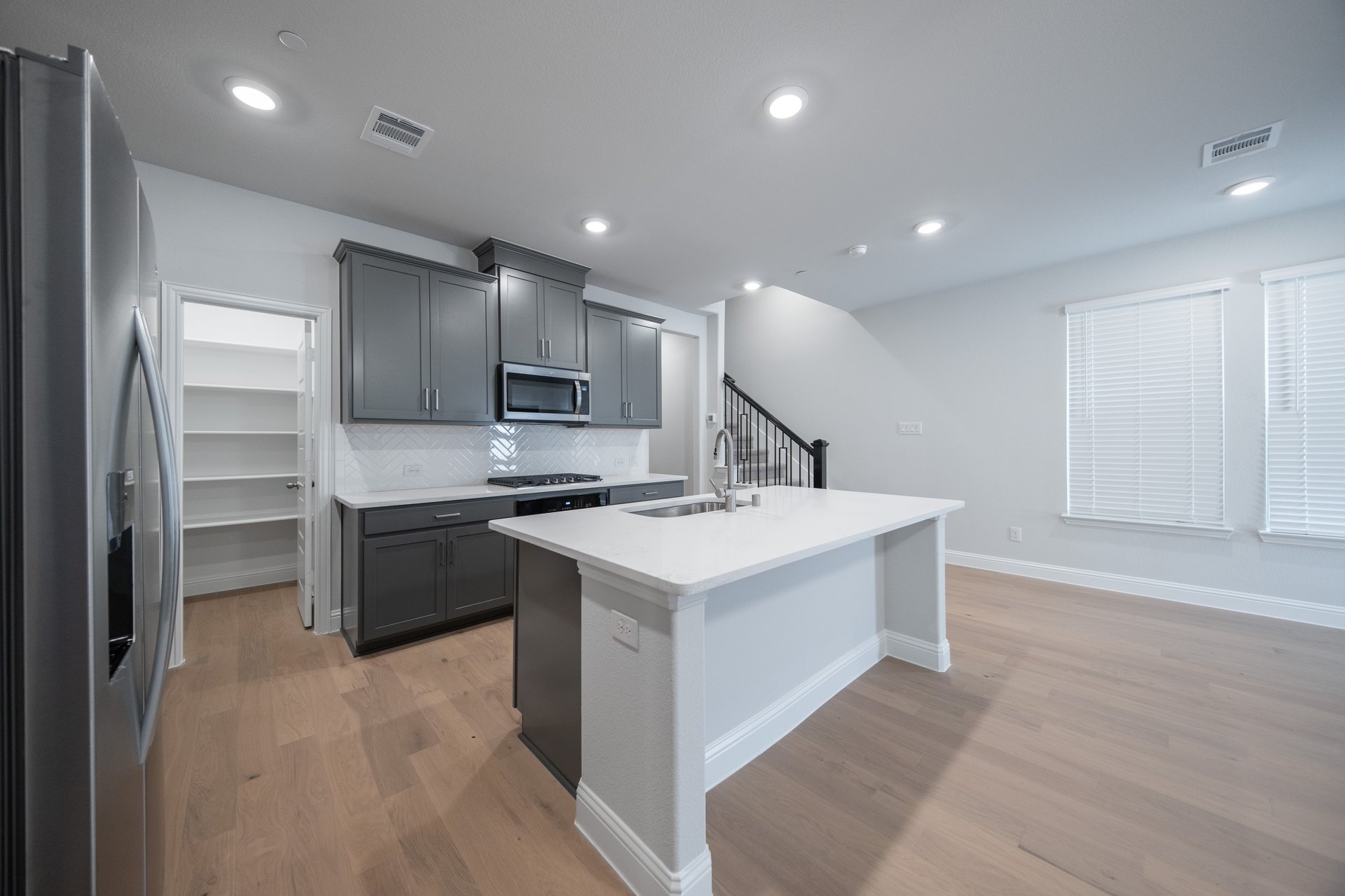 kitchen with large island and white countertops 