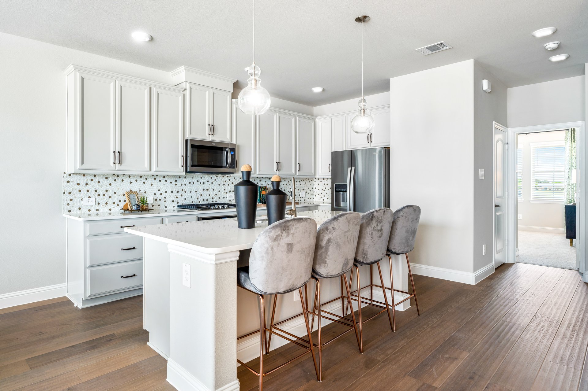 kitchen with island and white cabinets 