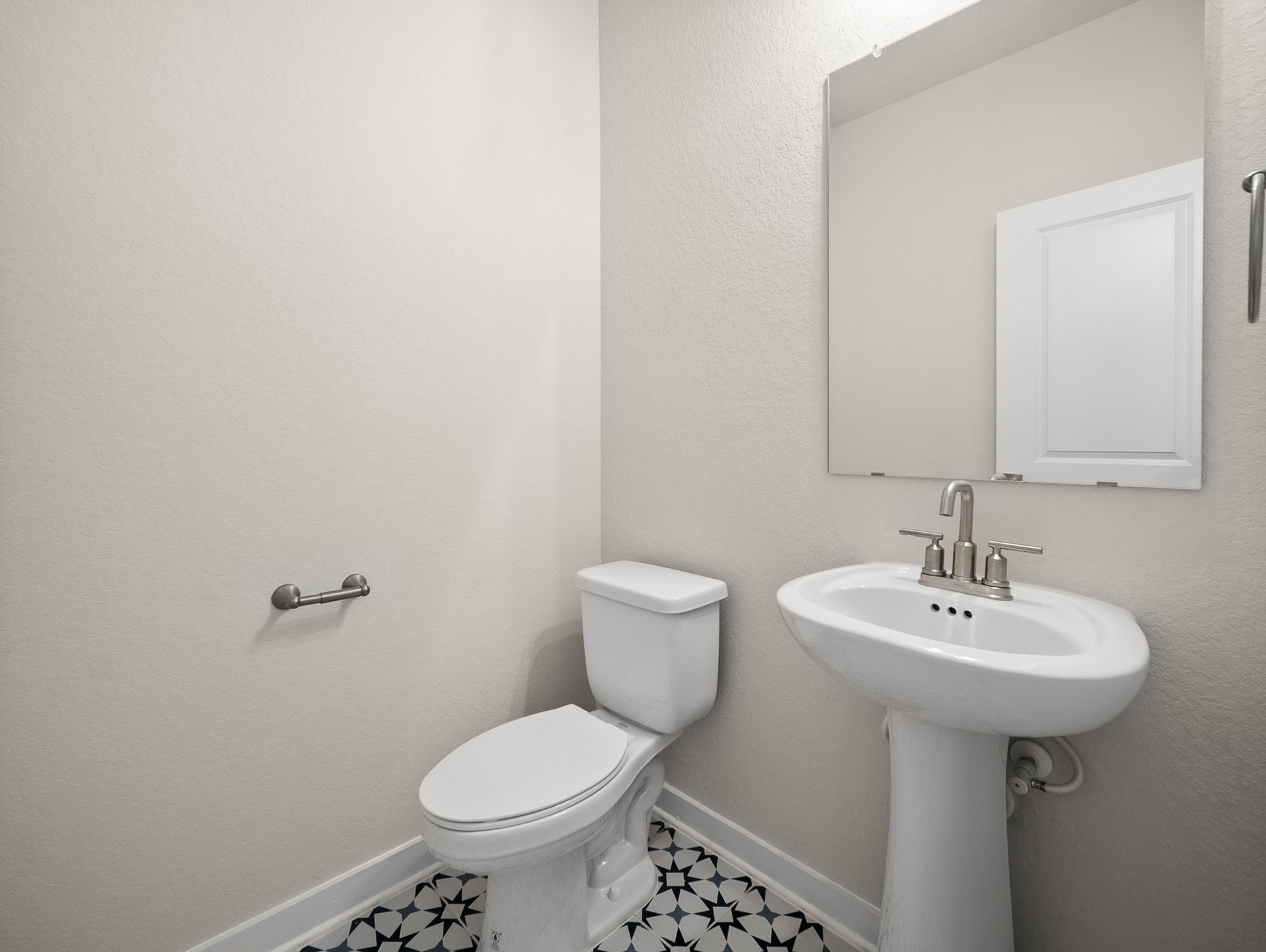 powder room with toilet & sink