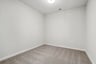 office with carpet and overhead light