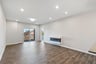 dining room with fireplace and overhead lighting
