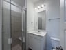 guest bathroom with walk-in shower