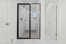 primary bathroom with an oversized shower
