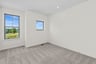 secondary bedroom with two windows