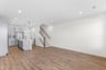 great room with windows and hardwood floors