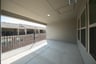 terrace with windows and iron railing 