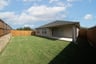 backyard of home with covered back patio