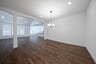 open dining room with hardwood flooring