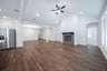 spacious great room with electric fireplace