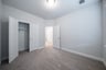 bedroom with carpet and closet 