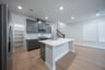 kitchen with large island and white countertops 