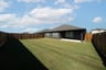 backyard of home with covered back patio