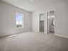 bedroom with carpet, a window & recessed lighting