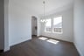 open dining room with hardwood flooring